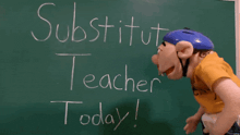 a puppet is standing in front of a chalkboard that says " substitut teach today "