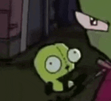 a cartoon character with a green head is standing next to another cartoon character in a dark room .