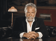 Most Interesting Man In The World GIF - Dos Equis The Most Interesting Man In The World Laugh GIFs