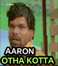 a picture of a man with the words aaron otha kotta on it