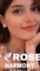 a close up of a woman 's face with the words rose harmony on the bottom right
