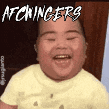 a baby is laughing with the words afckingers written above it
