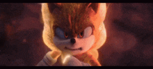 a close up of a cartoon character , sonic the hedgehog , with fire coming out of his eyes .