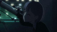 a girl is looking through a telescope with a city in the background
