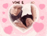 a picture of two men in a heart with the words vini and myo