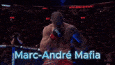 a man in a boxing ring with the name marc-andre mafia on the bottom