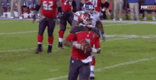 Tampa Bay Buccaneers Diving In GIF - Tampa Bay Buccaneers Diving In Dive In GIFs