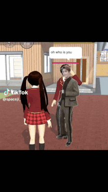 a girl in a red skirt is standing next to a man in a suit in a video game .
