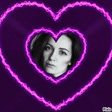 a picture of a woman is surrounded by a pink heart