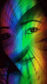 a colorful painting of a woman 's face with a rainbow background