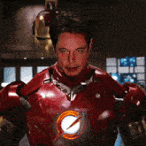 a man in a red suit with a lightning bolt on the chest