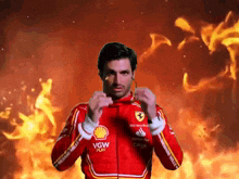 a man in a red jacket with the word shell on it