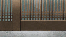 a close up of a metal fence with a window