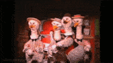 a group of stuffed birds are standing next to each other with the website mousesteps.com visible in the corner