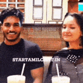 a man and a woman are sitting at a table with starttamilchat.in written in the corner