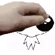 a close up of a person 's hand holding a small object .