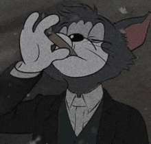 tom and jerry are smoking a cigarette in a suit and tie .