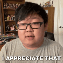 a man wearing glasses is saying i appreciate that