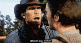 a man in a cowboy hat asks another man where 's our sunhat '
