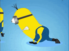 a cartoon minion is crawling on the ground with a shocked look on his face