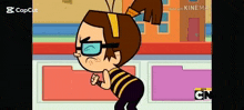 a cartoon character wearing glasses and a striped shirt is squatting down and making a funny face .
