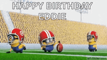 a group of minions are playing football on a field and they are wearing helmets and goggles .