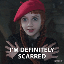 a girl with red hair and a red beret says " i 'm definitely scarred "