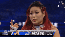 a woman with red hair is being punched in the face by a man