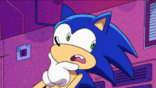 a cartoon drawing of sonic the hedgehog with his mouth open