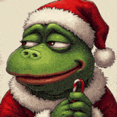 a green frog wearing a santa hat holds a candy cane