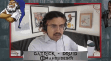 gazrick druid @mahrudeboy is a man with glasses and a mustache