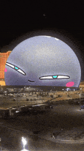 a large spherical object with a face on it