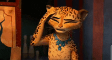 a cartoon leopard is scratching her head with her paw .