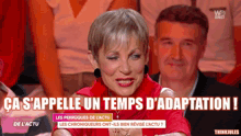 a woman in a red shirt says " ca s'appelle un temps d' adaptation ! "