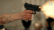 Pulling The Trigger The Family Business GIF - Pulling The Trigger The Family Business Gun Shots GIFs