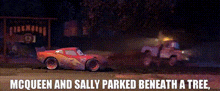 mcqueen and sally parked beneath a tree in a movie scene