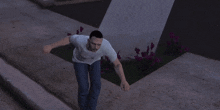 a man in a white t-shirt and blue jeans is running