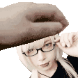 a woman wearing glasses and a hat with a hand covering her face .