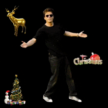 a man with his arms outstretched stands in front of a sign that says christmas