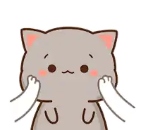 a cartoon cat with its paws on its face is looking at the camera .