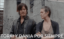 a man and a woman standing next to each other with the words torki y dania por siempre