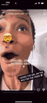 a close up of a person 's face with a smiley face on their nose and mouth .