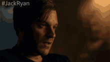 a close up of a man 's face with the hashtag #jackryan on the bottom