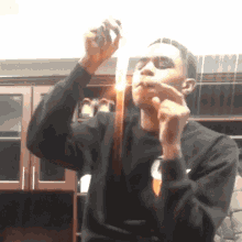 Lighting Up A Cigar Ybn Almighty Jay GIF - Lighting Up A Cigar Ybn Almighty Jay Ybn Almighty J GIFs