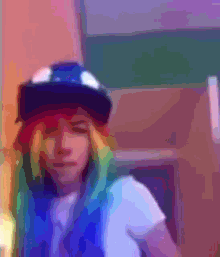 a pixelated image of a person wearing a hat and a vest