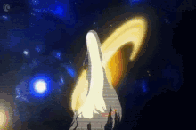 a silhouette of a woman with long hair stands in front of a blue background