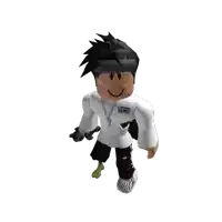 a boy wearing a white vans shirt and black shorts