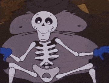 Skeleton unintentionally sits on an ape's lap