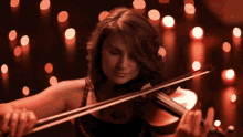 playing violin taylor davis leaves from the vine musician violinist