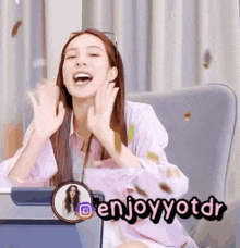 a woman sitting in a chair with the words enjoyyotdr written on the bottom